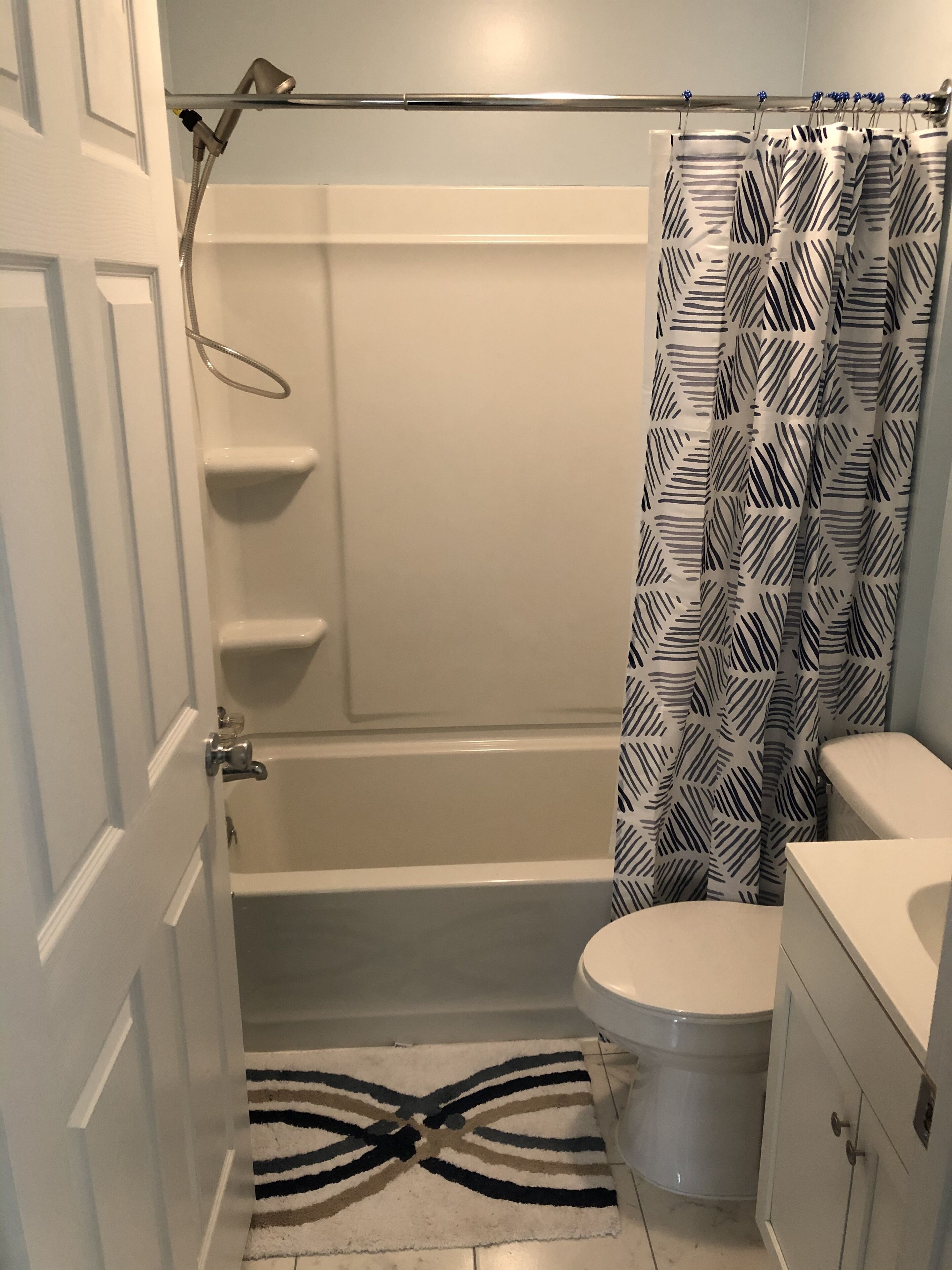 Combined shower/bathtub, hair dryer, towels, soap