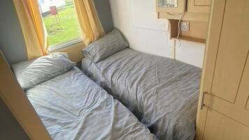 2 habitaciones y ropa de cama