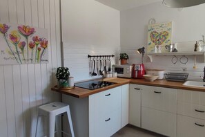 Geladeira, cooktop, lava-louças