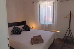 2 quartos, ferros/tábuas de passar roupa, Wi-Fi, roupa de cama
