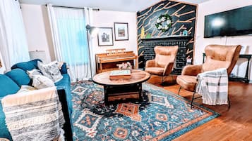 Smart TV, fireplace, books
