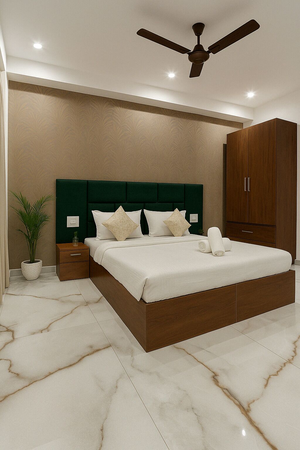 A bedroom with a large bed, a nightstand, a potted plant, a wardrobe, and a ceiling fan.