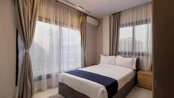 Apartemen Grand | 1 kamar tidur, tempat tidur Select Comfort, dan minibar