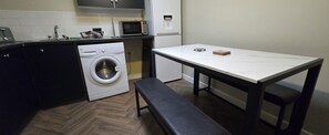 Fridge, microwave, toaster, cookware/dishes/utensils