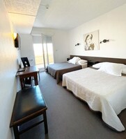 Individually decorated, laptop workspace, bed sheets