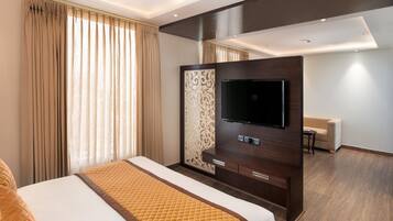 Family Room | Premium bedding, in-room safe, laptop workspace, iron/ironing board