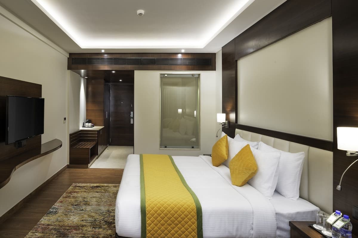 Habitación Club | Ropa de cama de alta calidad y caja de seguridad en la habitación