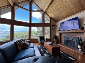 Smart TV, fireplace, table football, books