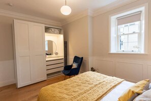 1 bedroom, desk, iron/ironing board, travel cot