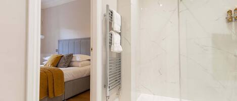 Shower, hair dryer, towels