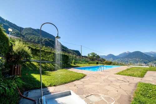Apartment 'Ella' with Mountain View, Pool (June - August), Private Terrace, and Wi-Fi