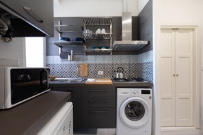 Fridge, microwave, stovetop, coffee/tea maker