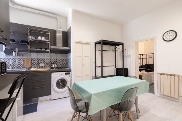 Fridge, microwave, stovetop, coffee/tea maker