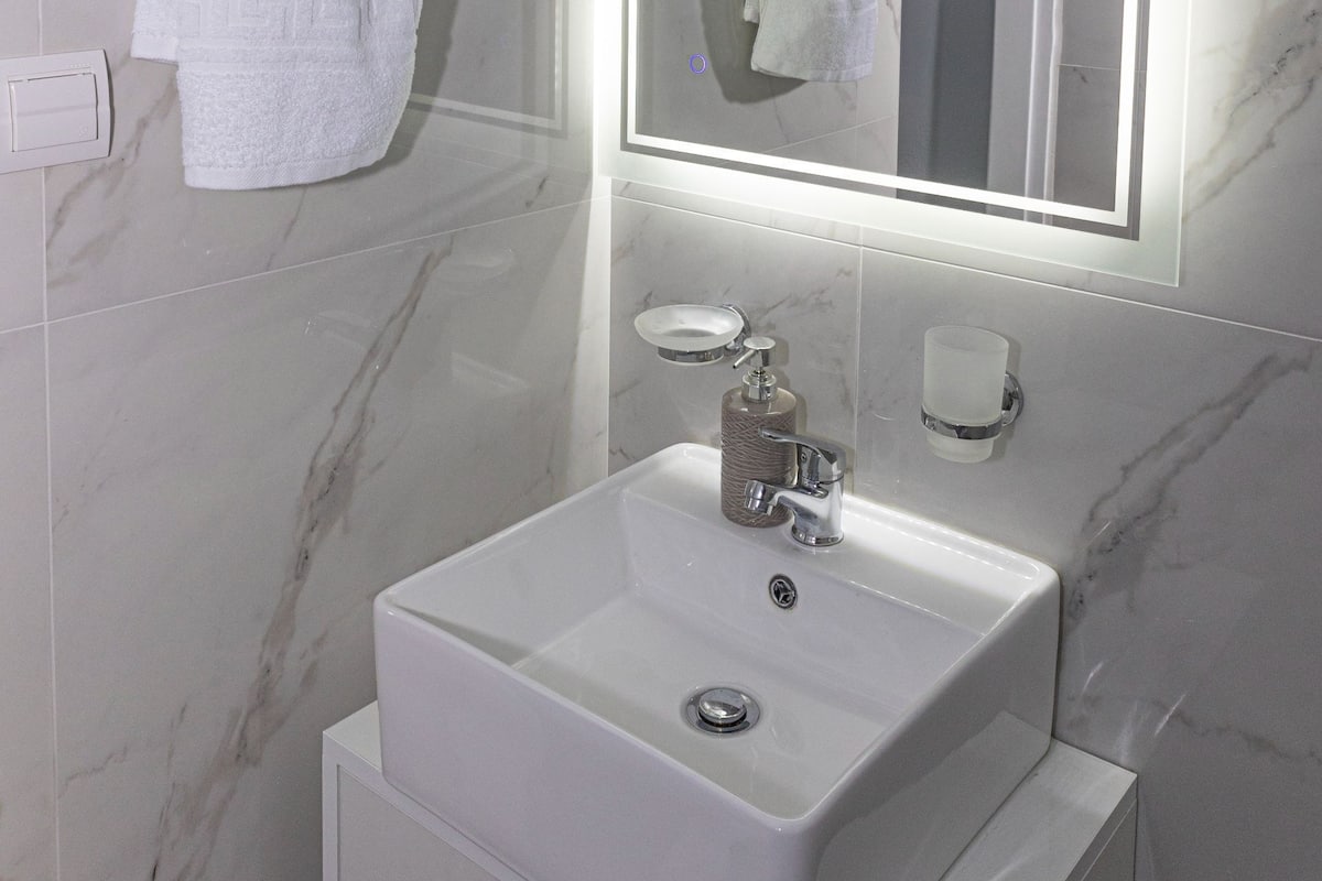 Shower, rainfall showerhead, hair dryer, slippers