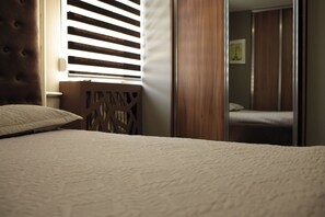 4 slaapkamers, een strijkplank/strijkijzer, gratis wifi, beddengoed