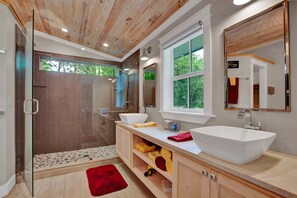 Combined shower/tub, hair dryer, towels, soap