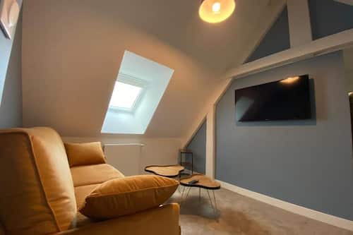 Family Suite | Living area | Flat-screen TV