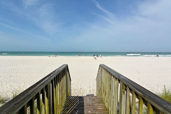 On the beach, sun loungers, beach towels