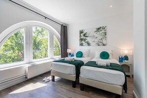 3 slaapkamers, een bureau, een strijkplank/strijkijzer, gratis wifi