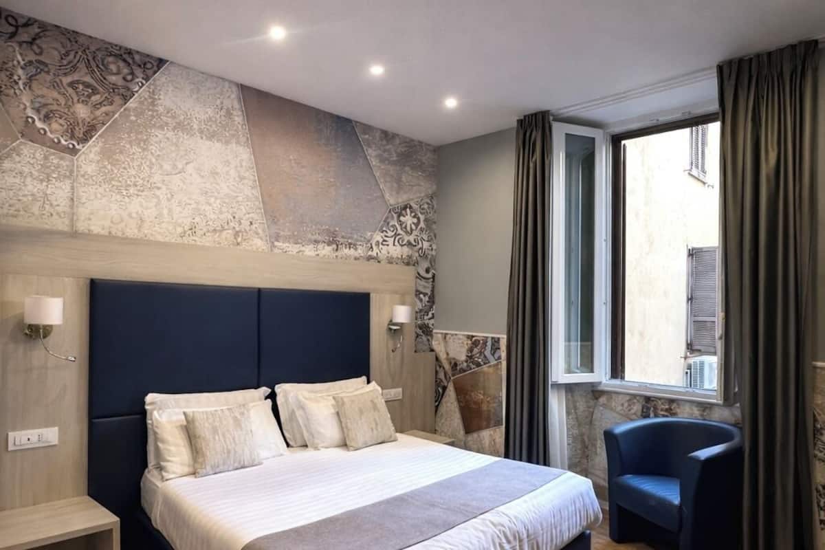 Deluxe Triple Room, 1 Bedroom | Minibar, in-room safe, desk, blackout curtains