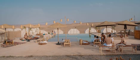 Outdoor pool, pool umbrellas, sun loungers