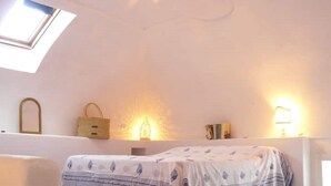 Unclassified image, 5 of 24, button - Domes, flowers and a small, cool pool (Le Forna)