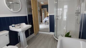 Bathtub, hair dryer, towels