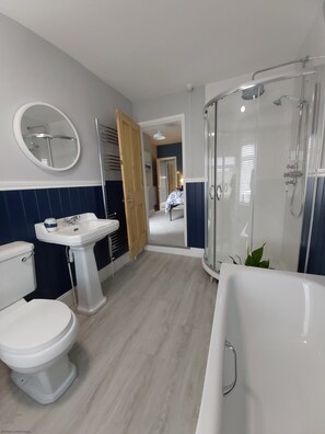 Bathtub, hair dryer, towels