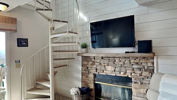 Condo, Multiple Beds, Balcony, Mountain View (#E306 - No Pets) | Living area | 40-inch flat-screen TV with cable channels, TV, fireplace