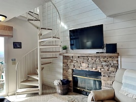 40-inch flat-screen TV with cable channels, TV, fireplace