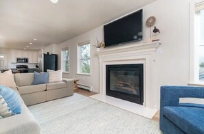 Smart TV, fireplace, books