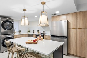 Fridge, microwave, oven, stovetop - Beachfront Condo w/ Pool, Pier Access & Chic Design! (Cocoa Beach)