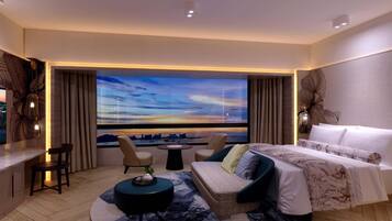 A modern hotel room with a large window, a sofa, a bed, and a small table.