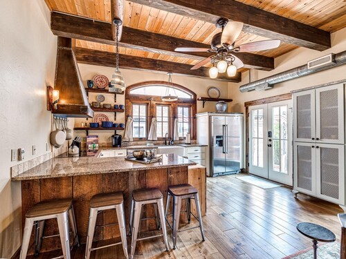 Tuscan feel with outdoor fireplace and cooking.