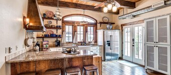 Tuscan feel with outdoor fireplace and cooking.