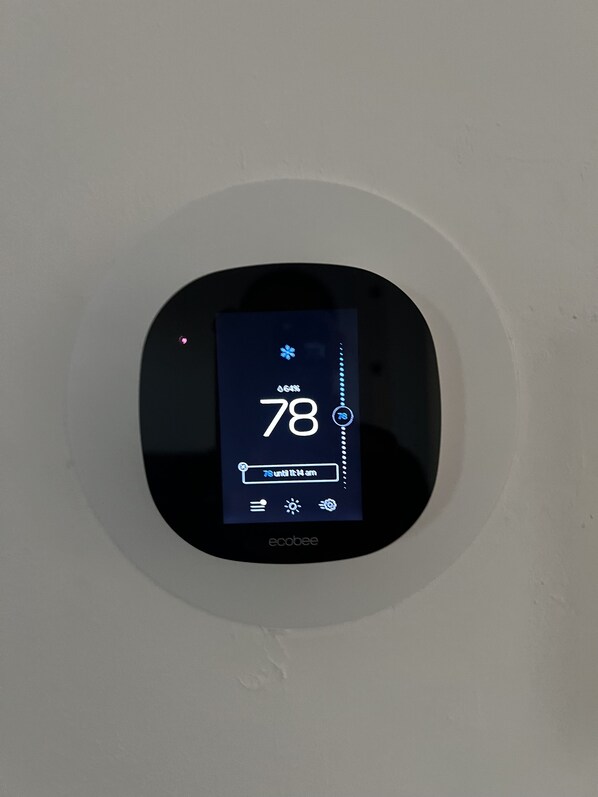 A digital thermostat displaying a temperature of 78 degrees. - new house 10 minutes to downtown (North Fort Myers)