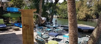 Top Floor Tropical Tree-house Waterfront Gulf & natural springs wildlife retreat