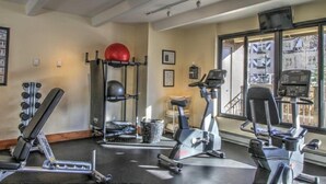 A gym with exercise equipment, a treadmill, and a stationary bike. - 3 Bedroom Luxury Residence in Lionshead Village - Mere Steps to Eagle Bahn Gondola (Vail)