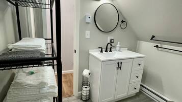 Combined shower/tub, hair dryer, towels, soap