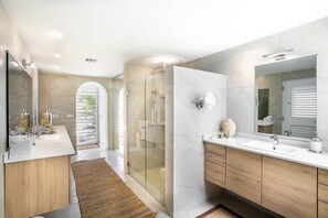 Shower, hair dryer, towels, shampoo