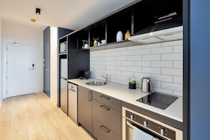 Pet Lovers Studio (With free secure parking) | Private kitchen | Fridge, microwave, oven, stovetop