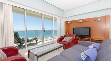 Condo conforto | Área de estar | TV