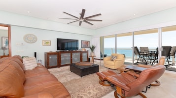 Condo conforto | Área de estar | TV