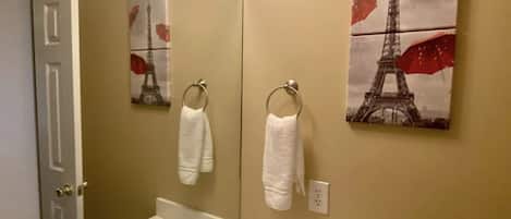 Combined shower/tub, hair dryer, towels, toilet paper