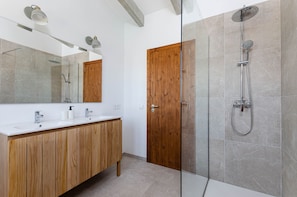 Bathtub, hair dryer, towels