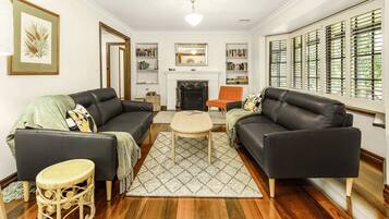 TV, fireplace, books, offices