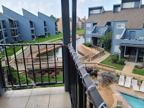 Outdoor dining - Relaxing Lake Conroe Condo overlooking the pool and lake (Montgomery)