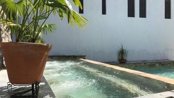 Outdoor pool, open 7:00 AM to 10:00 PM, pool umbrellas, pool loungers