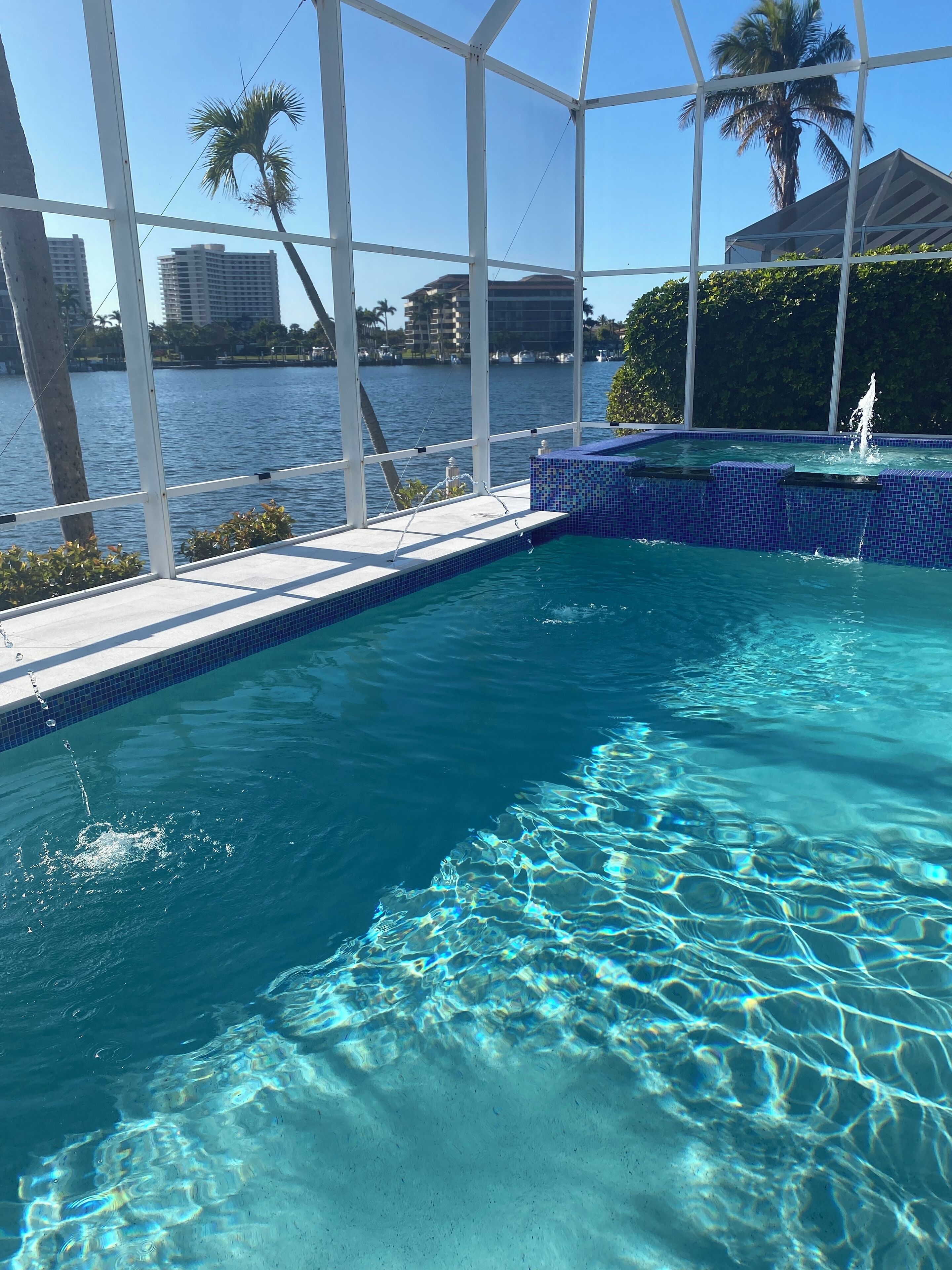 Pool has side emitters and spa fountain.
