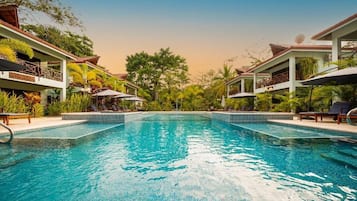 Outdoor pool, open 8:00 AM to 10:00 PM, pool umbrellas, pool loungers